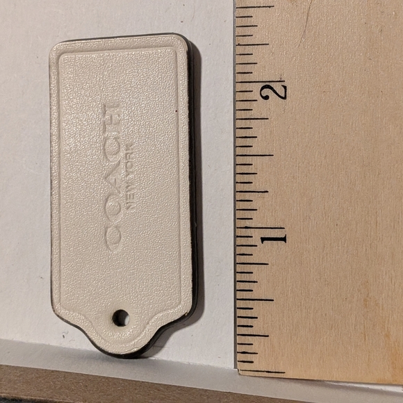 Coach White Leather Tag